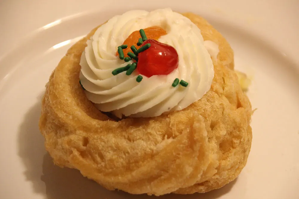 candied fruit decorate the zeppole