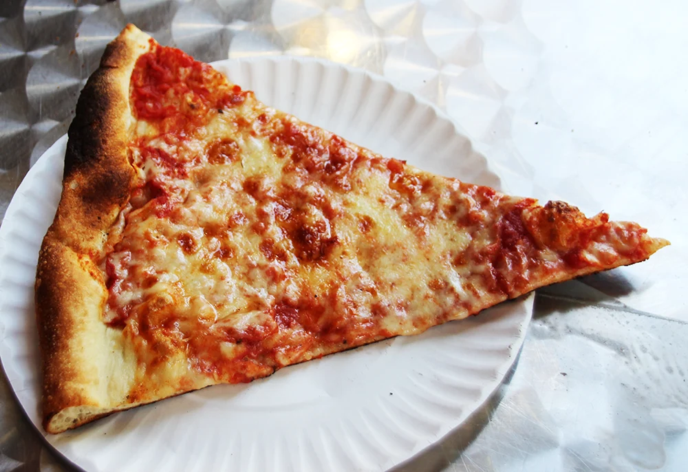 A New York Slice from Joe's Pizza; its a slice, not a piece of pizza