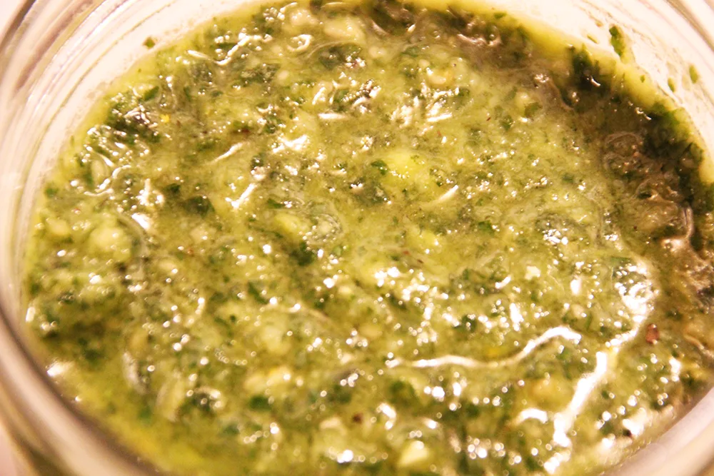 Pesto made with basil pine nuts garlic and cheese